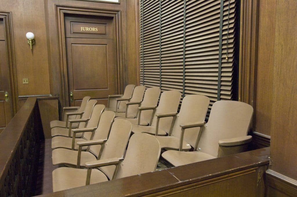 empty jury box in courtroom