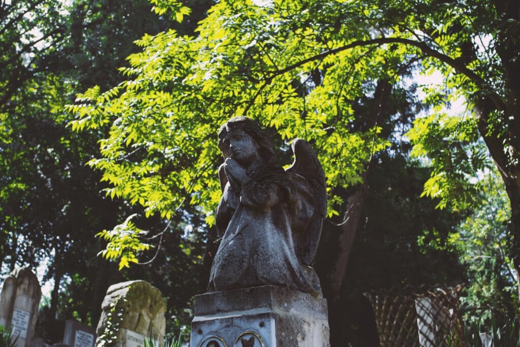 Angel statue in graveyard