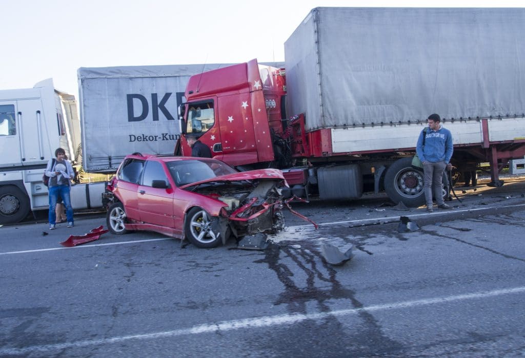 car damaged after a serious truck accident