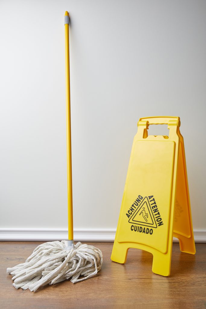 wet floor sign and mop