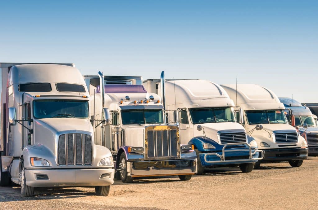 row of semi trucks